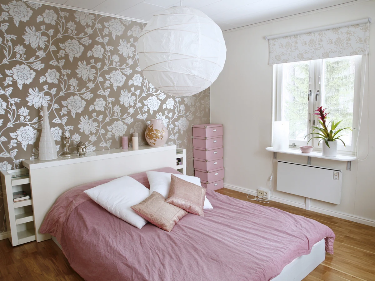 Bedroom with floral wallpaper hung by York Painters