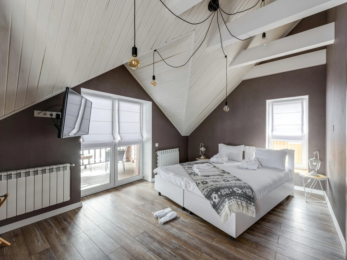 bedroom-painting-loft-bedroom-dark-york-painters Loft bedroom with bold dark feature wall painted by York Painters