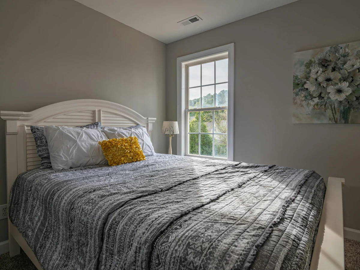 Simple grey bedroom painted by York Painters