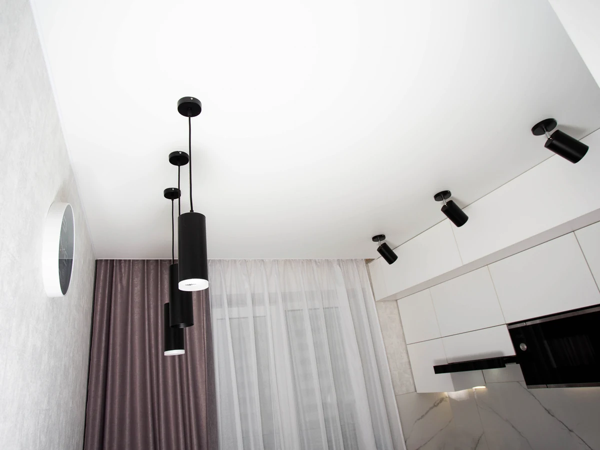 White ceiling painting with contrast black wall in a York property