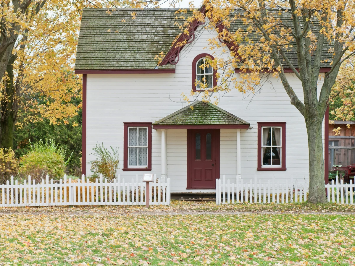exterior-painting-white-cottage-exterior-york-painters White cottage with freshly painted exterior walls in York