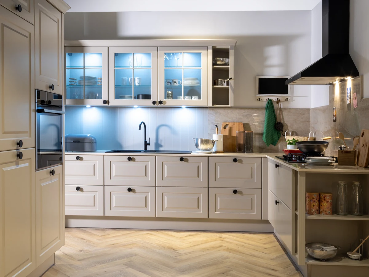 Country-style kitchen with painted cabinets by York Painters