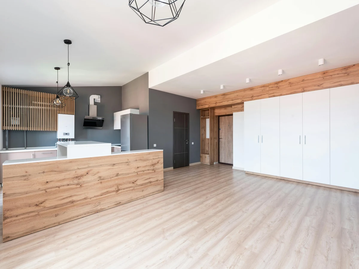Modern open-plan kitchen with painted cabinets by York Painters