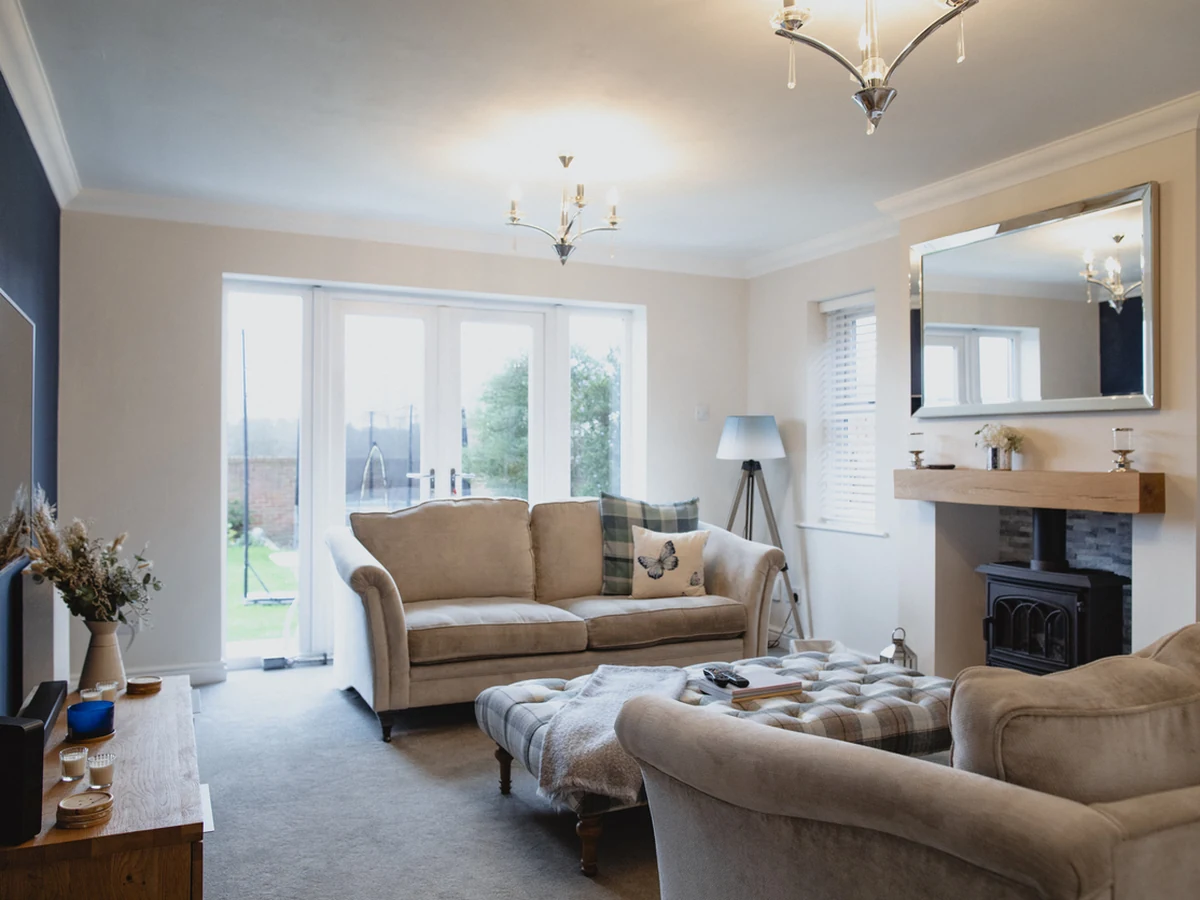 living-room-painting-living-room-blue-york-painters Living room with bold blue feature wall painted by York Painters