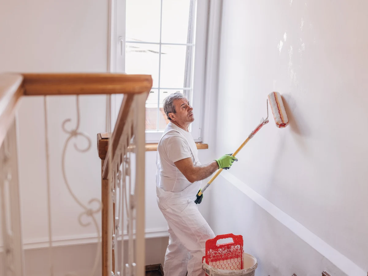 House painter rolling a wall in York by York Painters, professional decorators