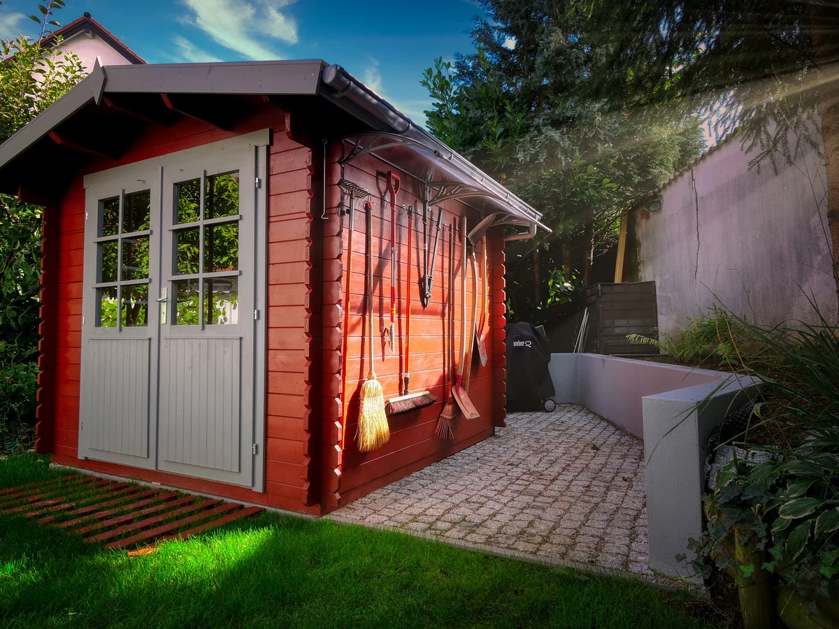 Red painted garden shed and timber fencing in York