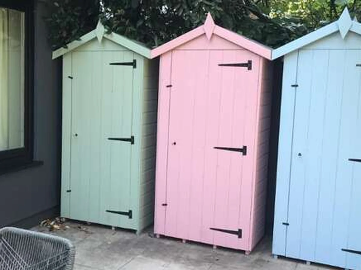 Three pastel painted wooden fence panels by York Painters